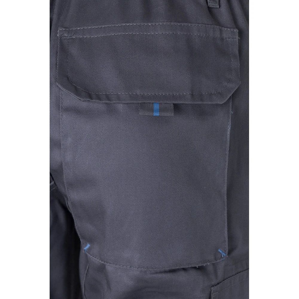 VL HYPNOS. Tvåfärgade byxor i twill med flera fickor (200g/m²), i bomull (35%) och polyester (65%)