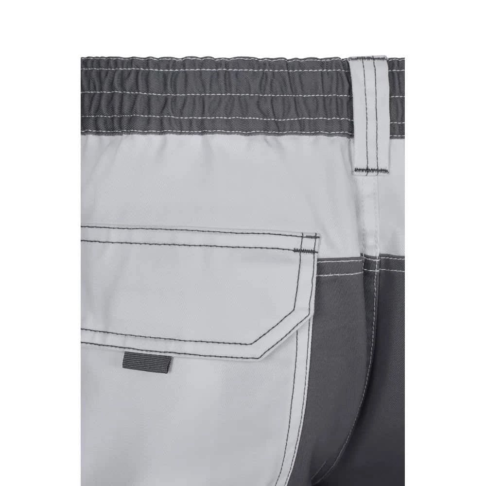 VL NJORD. Tvåfärgade byxor i twill med flera fickor (240 g/m²), i bomull (35 %) och polyester (65 %)