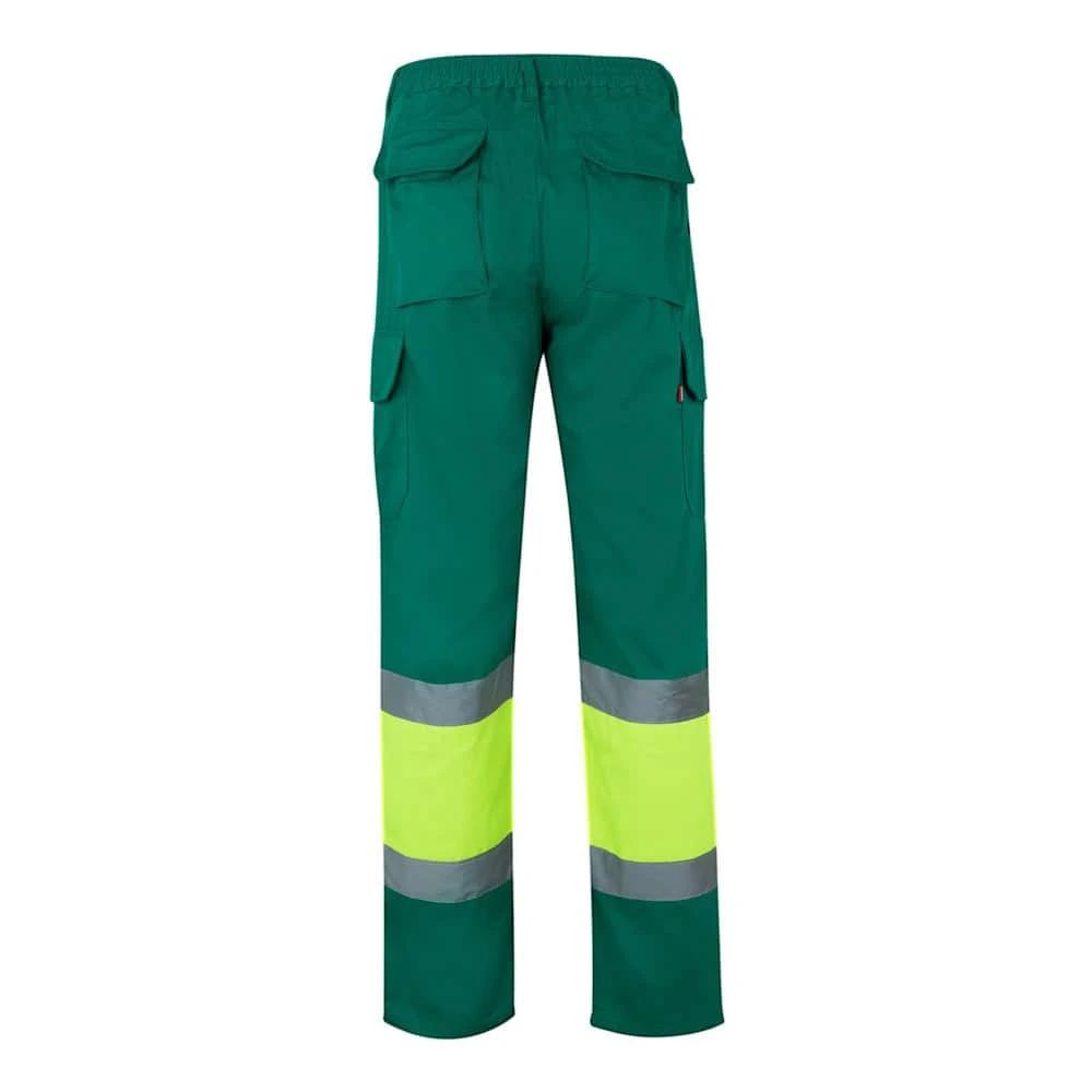 Tvåfärgade arbetsbyxor i twill med fickor, reflexdetaljer, i bomull och polyester.