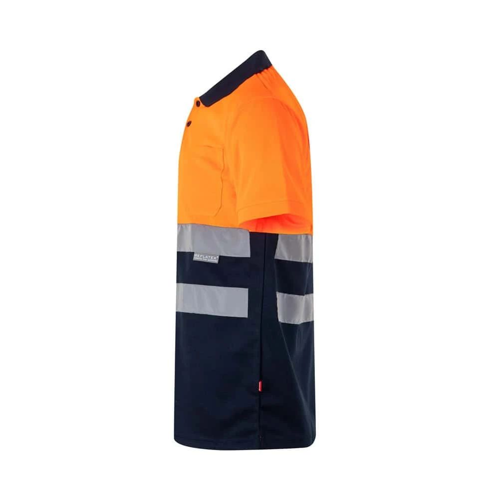 Tvåfärgad pikétröja i polyester med fågelögonmönster och korta ärmar.
