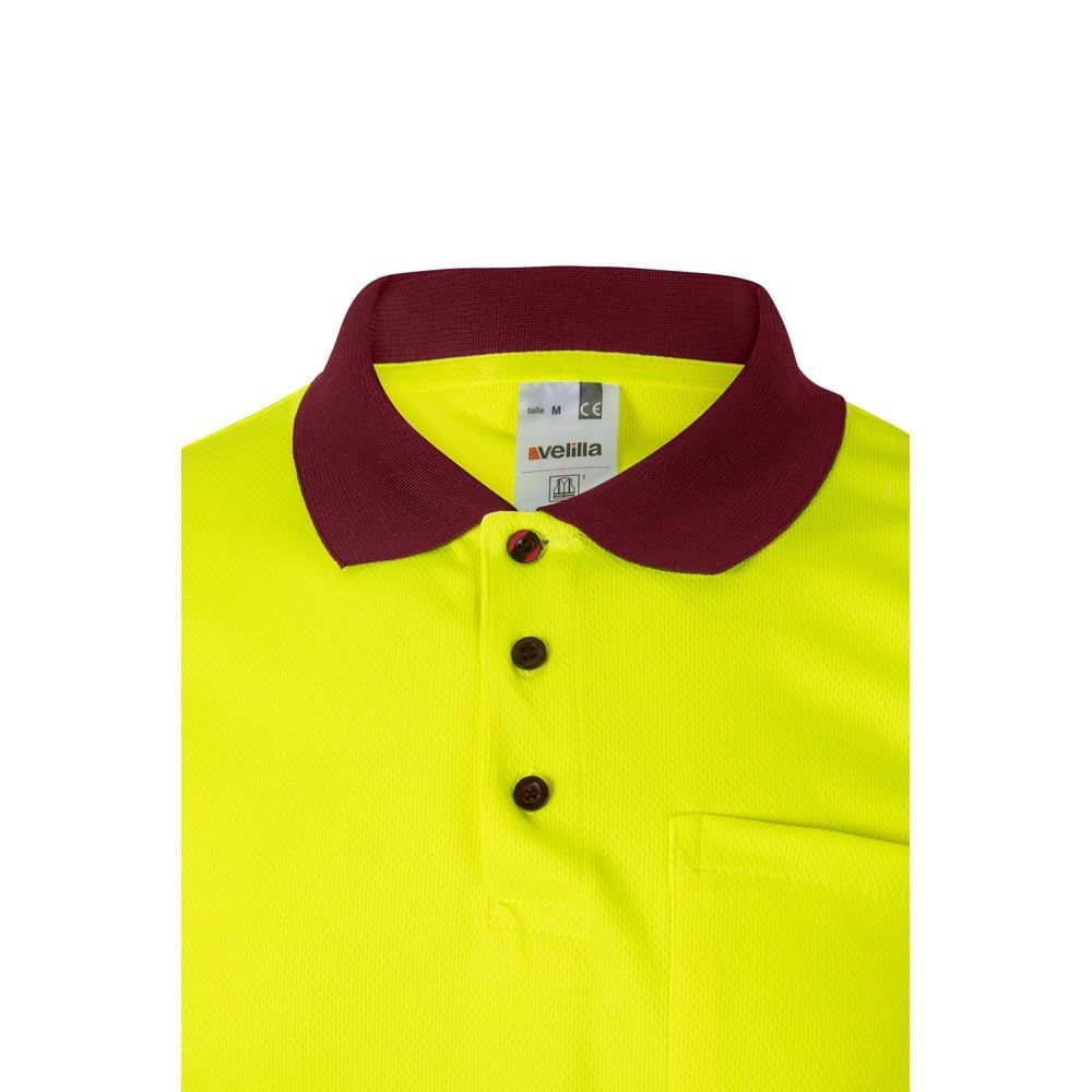 Tvåfärgad pikétröja i polyester med fågelögonmönster och kontrastfärgat krage.