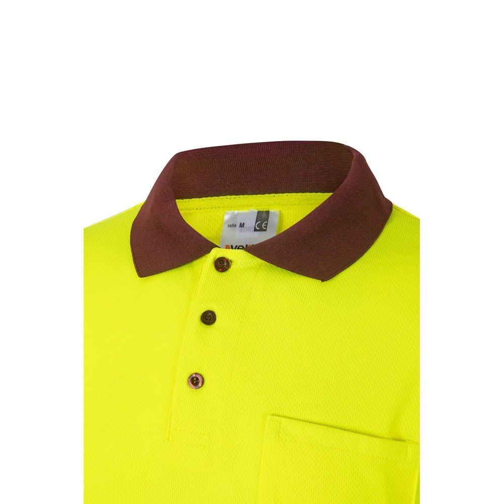 Gul pikétröja med brunt krage och fågelögonmönster, långärmad, 100% polyester.