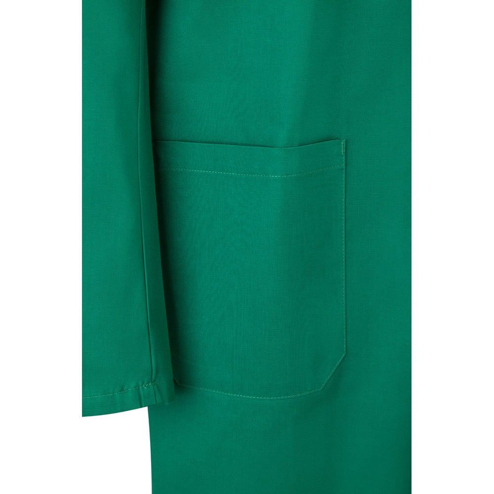 Vägg i grönt med praktisk ficka, tillverkad av ExpoT Twillblus 175g/m² i bomull och polyester.