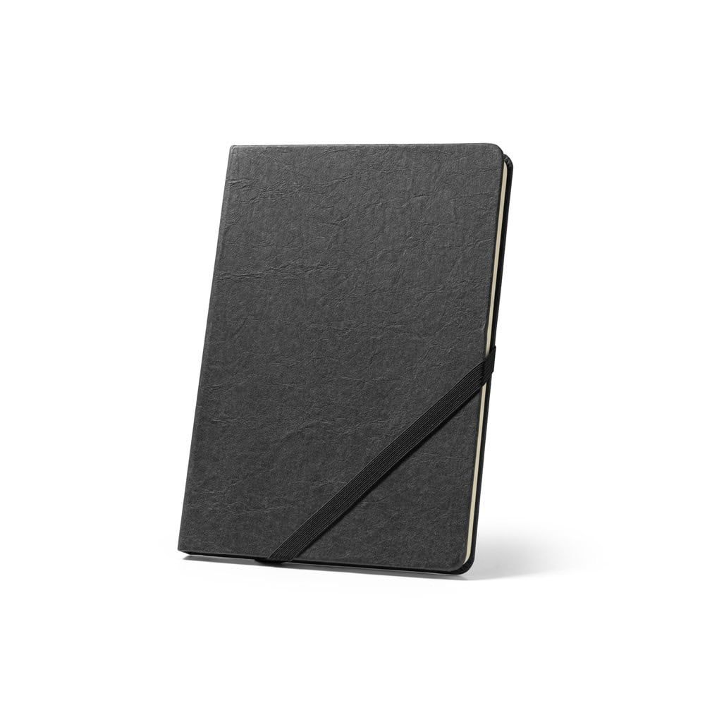 HUXLEY. A5-anteckningsblock, gjord av vattenavvisande papper, med fodrade sidor gjorda av ett FSC™-certifierat material och andra kontrollerade material