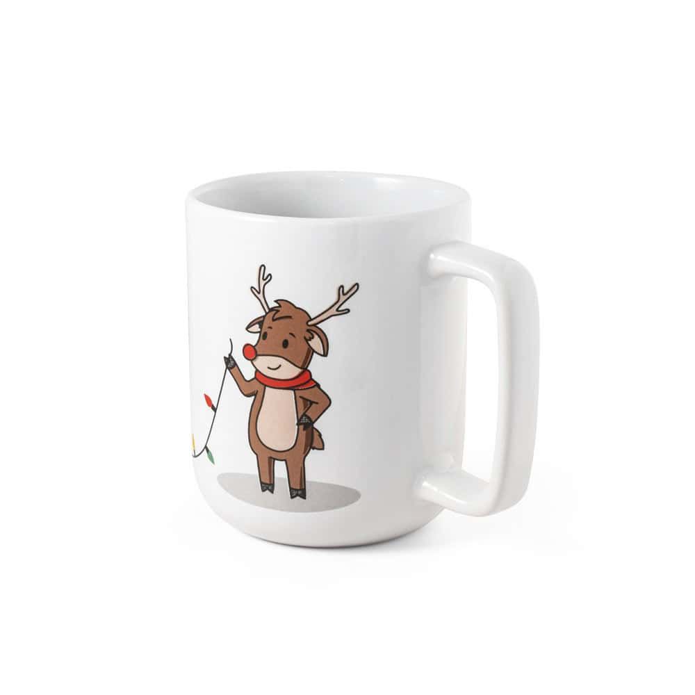 Mugg med jultryck av ren med horn och snöre, perfekt för julfirande.